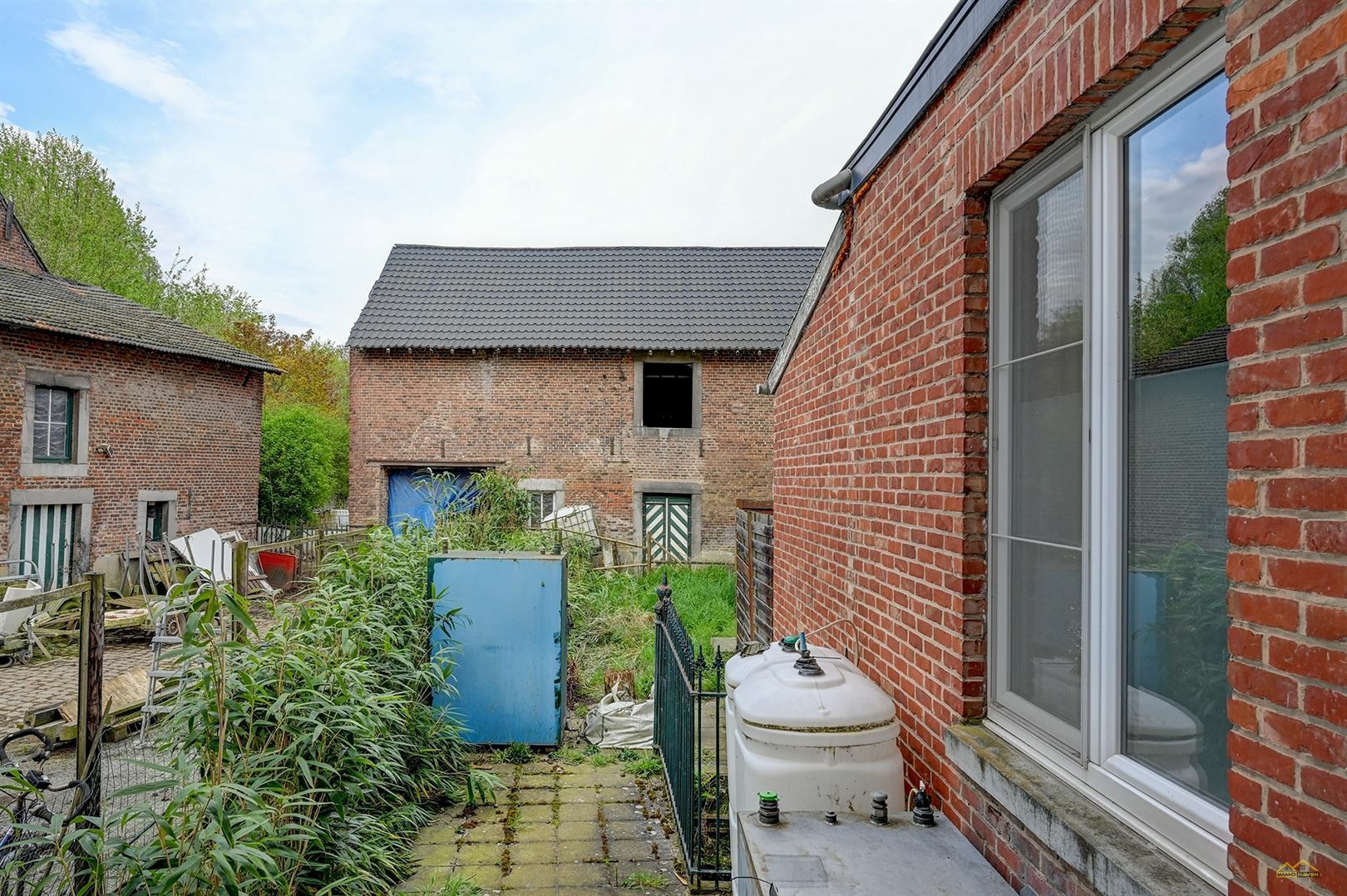 Handelspand met woonst te koop in SINT-TRUIDEN